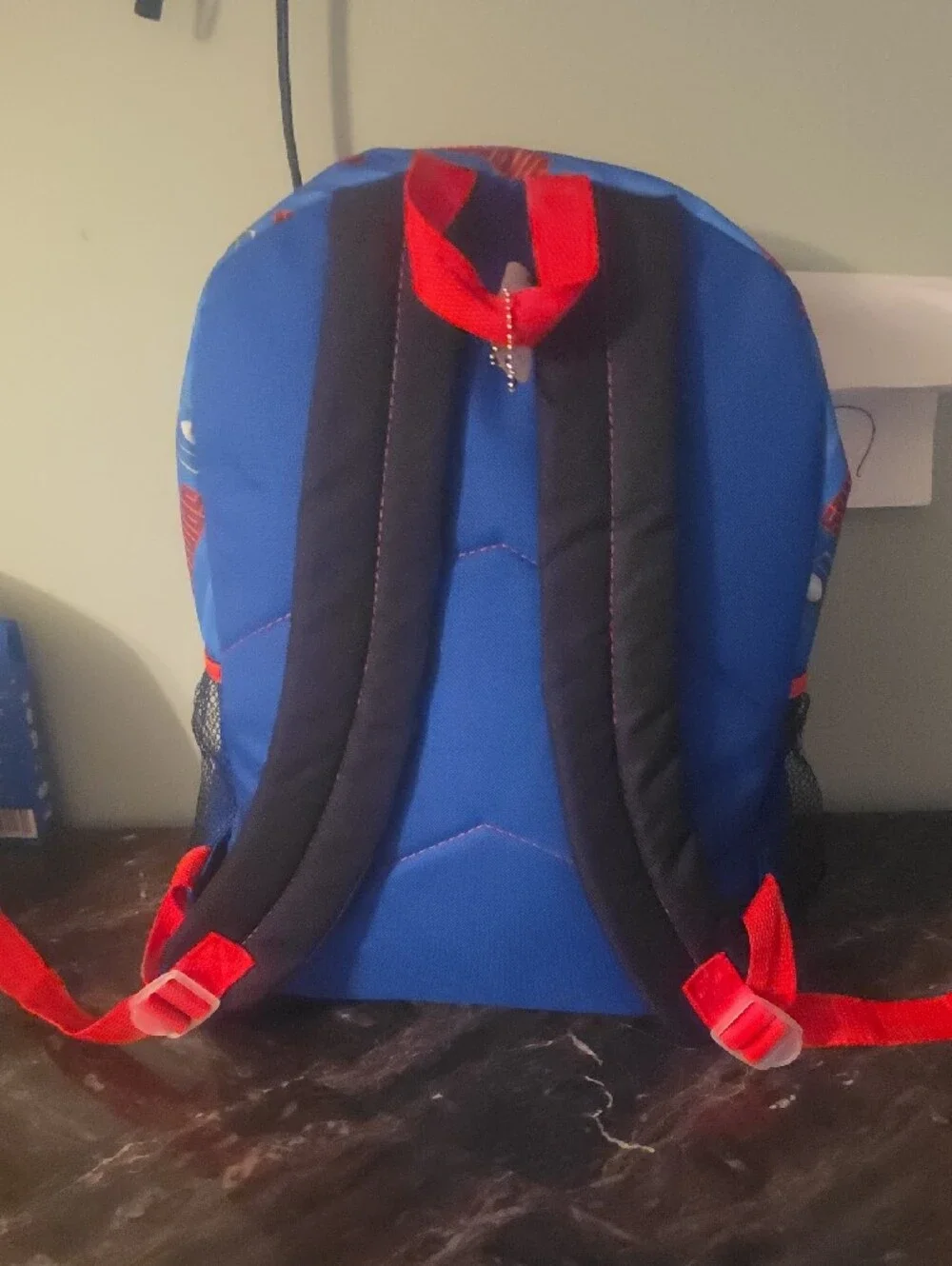 🚨 Spiderman Kids Red and Blue Backpack with Web Mask Graphic